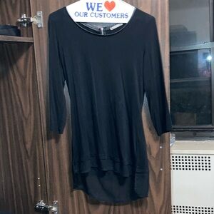 Brand new with tags! Black top with a zipper back.